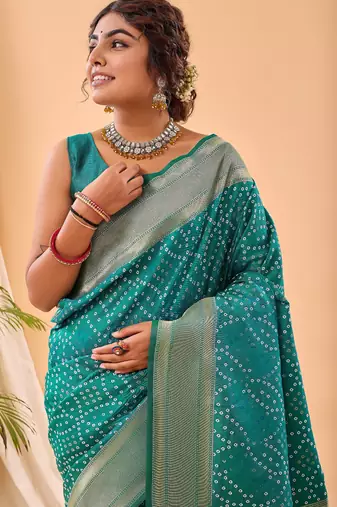 Turquoise woven silk saree with blouse piece