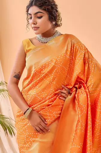 Yellow woven silk saree with blouse piece