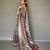 Turquoise printed silk saree with blouse piece