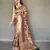 Beige printed silk saree with blouse piece