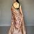 Beige printed silk saree with blouse piece