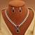 Maroon color kundan necklace set