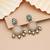 White color kundan earrings