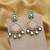White color kundan earrings