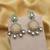 Off white color kundan earrings