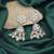 White color kundan earrings
