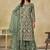 Green embroidered zari work net palazzo suits
