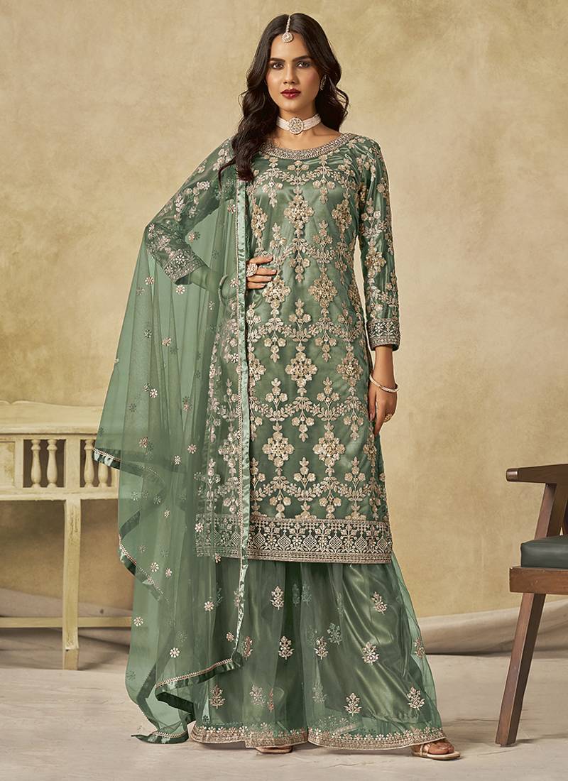 Green embroidered zari work net palazzo suits
