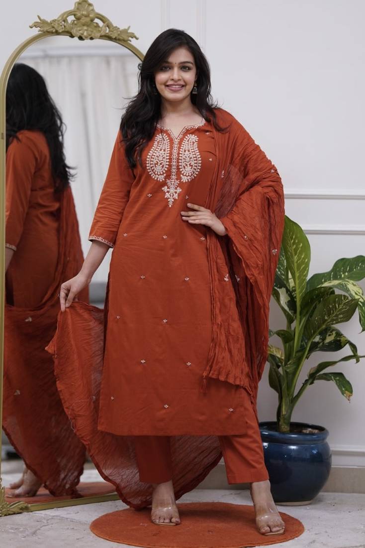 Premium ethnic wear for women featuring a graceful Rust kurta set