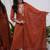 Premium ethnic wear for women featuring a graceful Rust kurta set