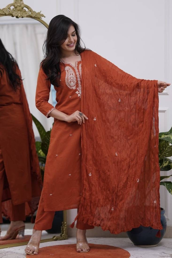 Premium ethnic wear for women featuring a graceful Rust kurta set