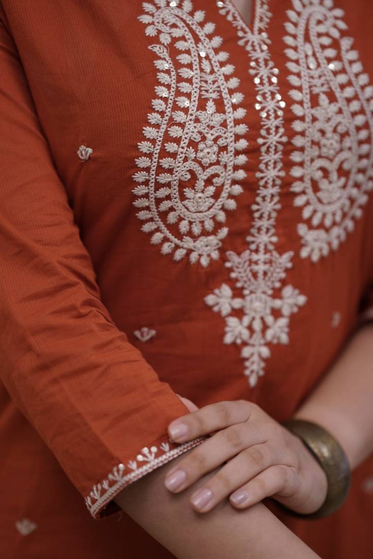Premium ethnic wear for women featuring a graceful Rust kurta set