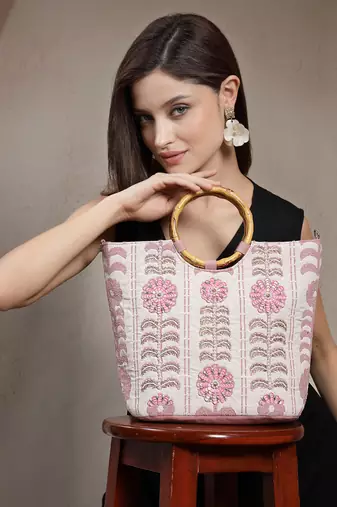 petal posh beige cotton floral embellished handheld bag