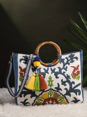 tribal sutra off white canvas floral embroidered handheld bag 1