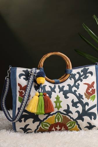 tribal sutra off white canvas floral embroidered handheld bag