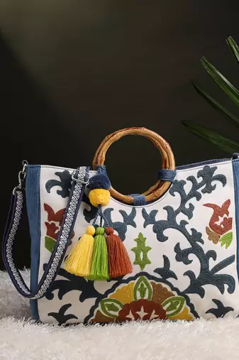 tribal sutra off white canvas floral embroidered handheld bag
