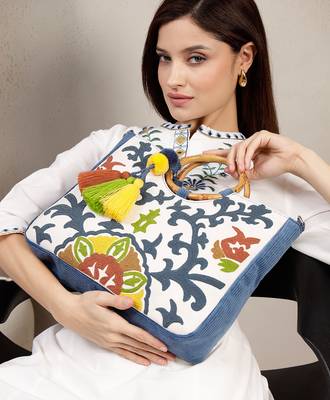 tribal sutra off white canvas floral embroidered handheld bag 3