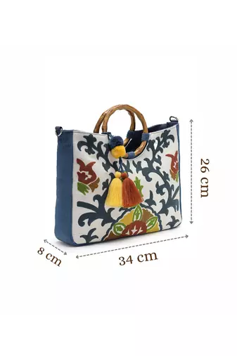 tribal sutra off white canvas floral embroidered handheld bag