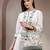 petal posh sage green cotton botanical embellished handheld bag