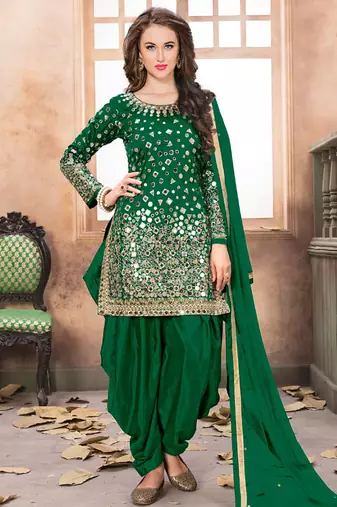Green embroidered mirror work silk patiala suits