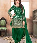 Green embroidered mirror work silk patiala suits
