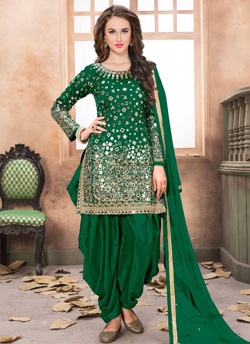 Green embroidered mirror work silk patiala suits