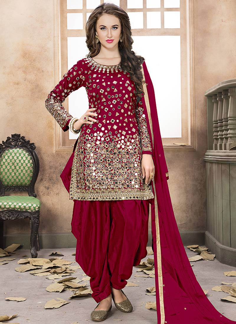 Red embroidered mirror work silk patiala suits