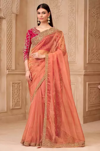 Gold sparkle georgette silk saree with brocade weave blouse