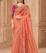 Gold sparkle georgette silk saree with brocade weave blouse