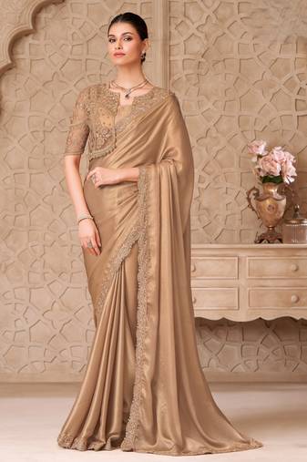 Gold shimmer satin georgette saree with jacket blouse