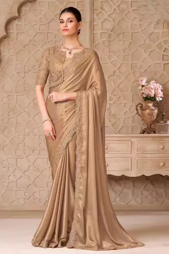 Gold shimmer satin georgette saree with jacket blouse