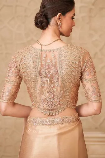 Gold shimmer satin georgette saree with jacket blouse