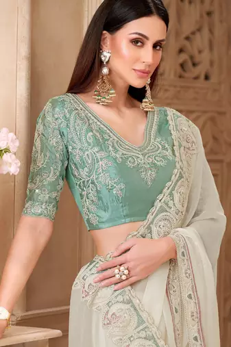 Powder white georgette silk blend saree with satin silk blend blouse