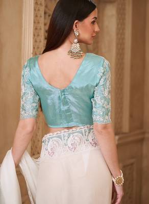 Powder white georgette silk blend saree with satin silk blend blouse 4
