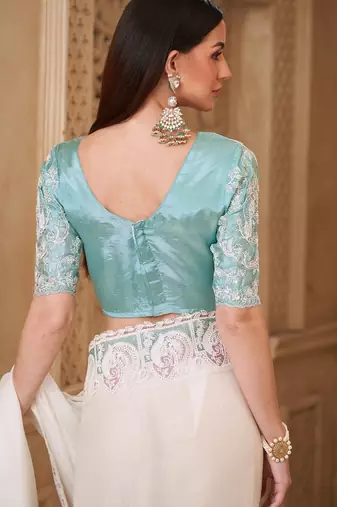 Powder white georgette silk blend saree with satin silk blend blouse