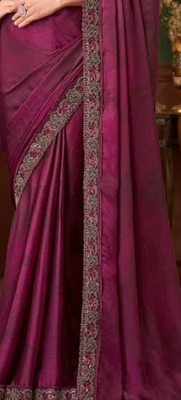 Purple silk saree with beautiful embellishments, paired with an embroidered blouse. 2