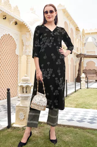 Women Heavy Rayon Kurta With Trouser