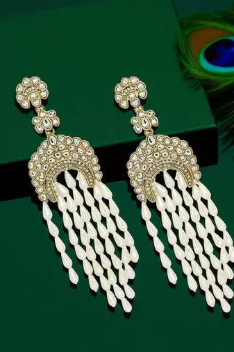 Gold plated kundan studded dangler earrings