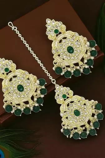 Gold plated cubic zircon studded green earrings with maangtikka set