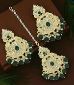 Gold plated cubic zircon studded green earrings with maangtikka set