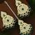 Gold plated cubic zircon studded green earrings with maangtikka set
