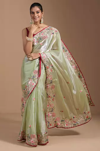 ethnic motifs embroidered georgette saree in green