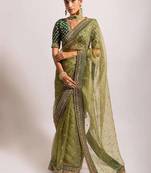 ethnic motifs embroidered georgette saree in green