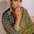 ethnic motifs embroidered georgette saree in green