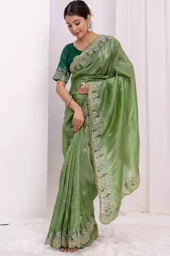 ethnic motifs embroidered georgette saree in green