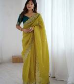 ethnic motifs embroidered georgette saree in yellow