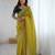 ethnic motifs embroidered georgette saree in yellow