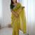 ethnic motifs embroidered georgette saree in yellow