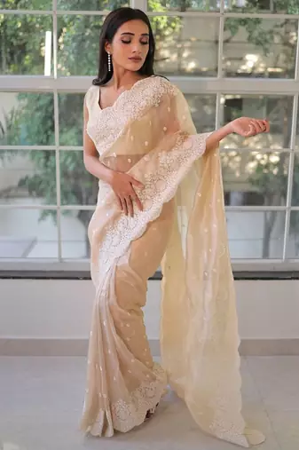 ethnic motifs embroidered georgette saree in offwhite