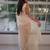 ethnic motifs embroidered georgette saree in offwhite